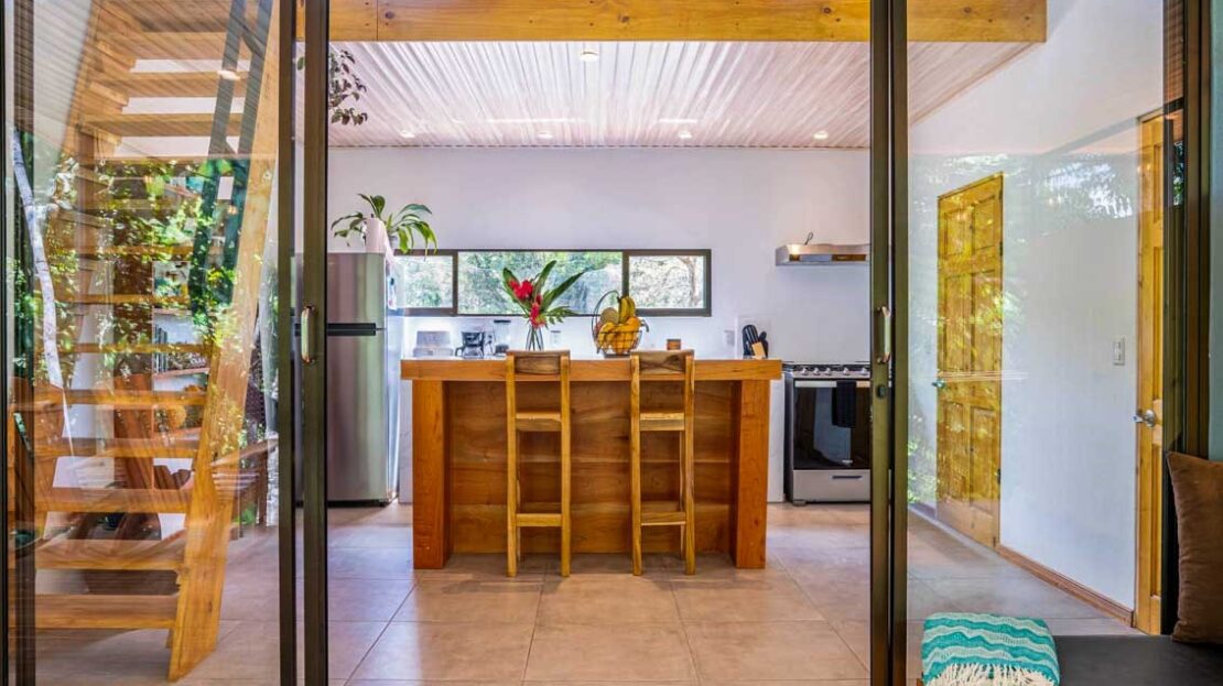 A 1-bedroom home PERFECT for a couple or an Airbnb rental – plus a HUGE jungle backyard with a year-round river and many magical swim holes